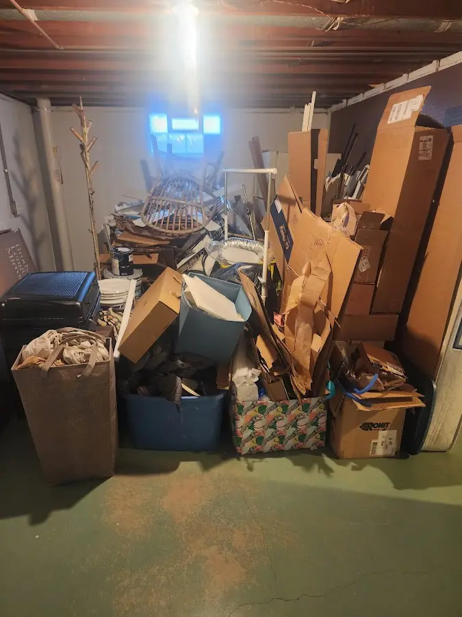 Roll-off dumpster container at job site for Yard Waste Dumpster Rental in Norwood